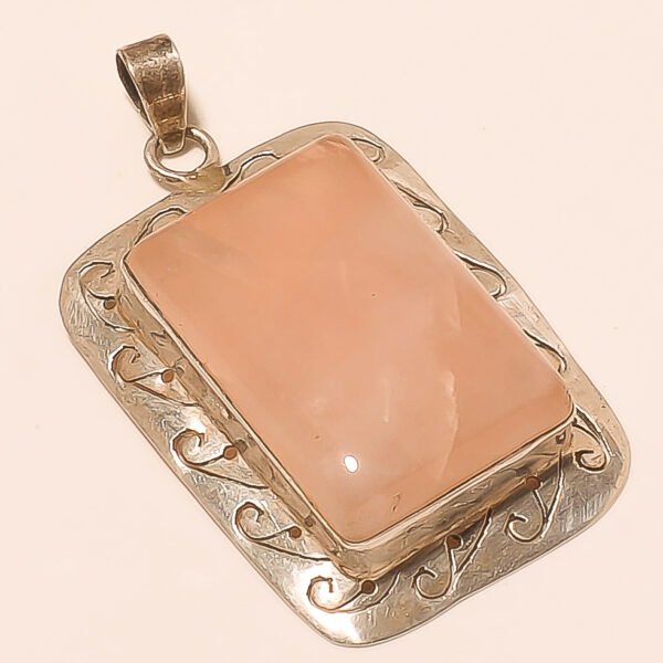 SILVER CARVED ROSE QUARTZ PENDANT