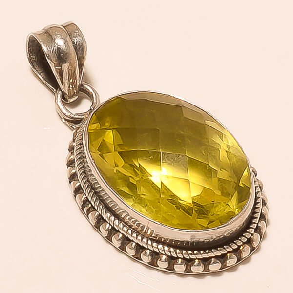 VINTAGE 92.5 STERLING SILVER CARVED BEAUTIFUL LEMON-TOPAZ PENDANT